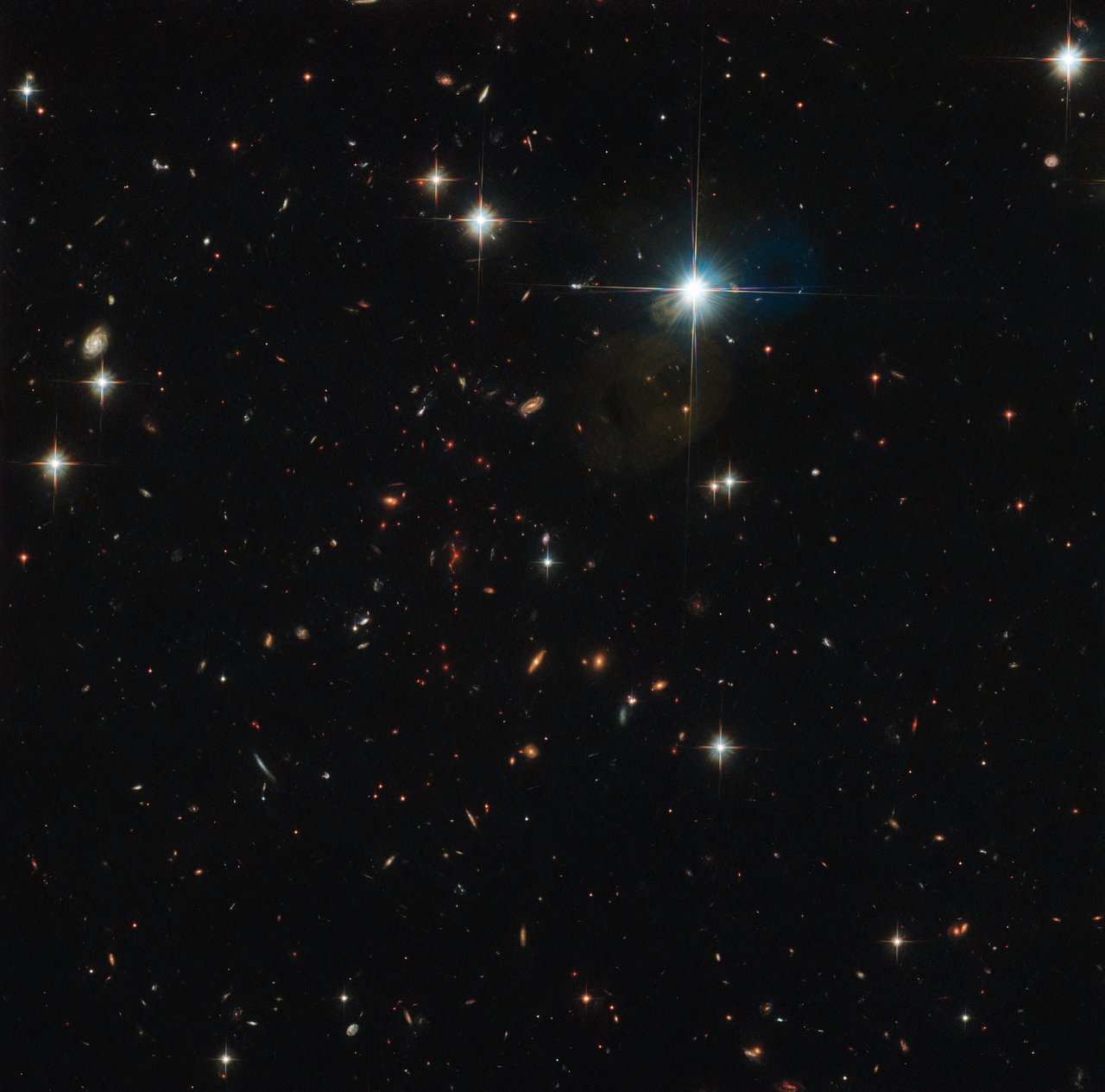 Hubble Peers at an Ancient Galaxy Cluster